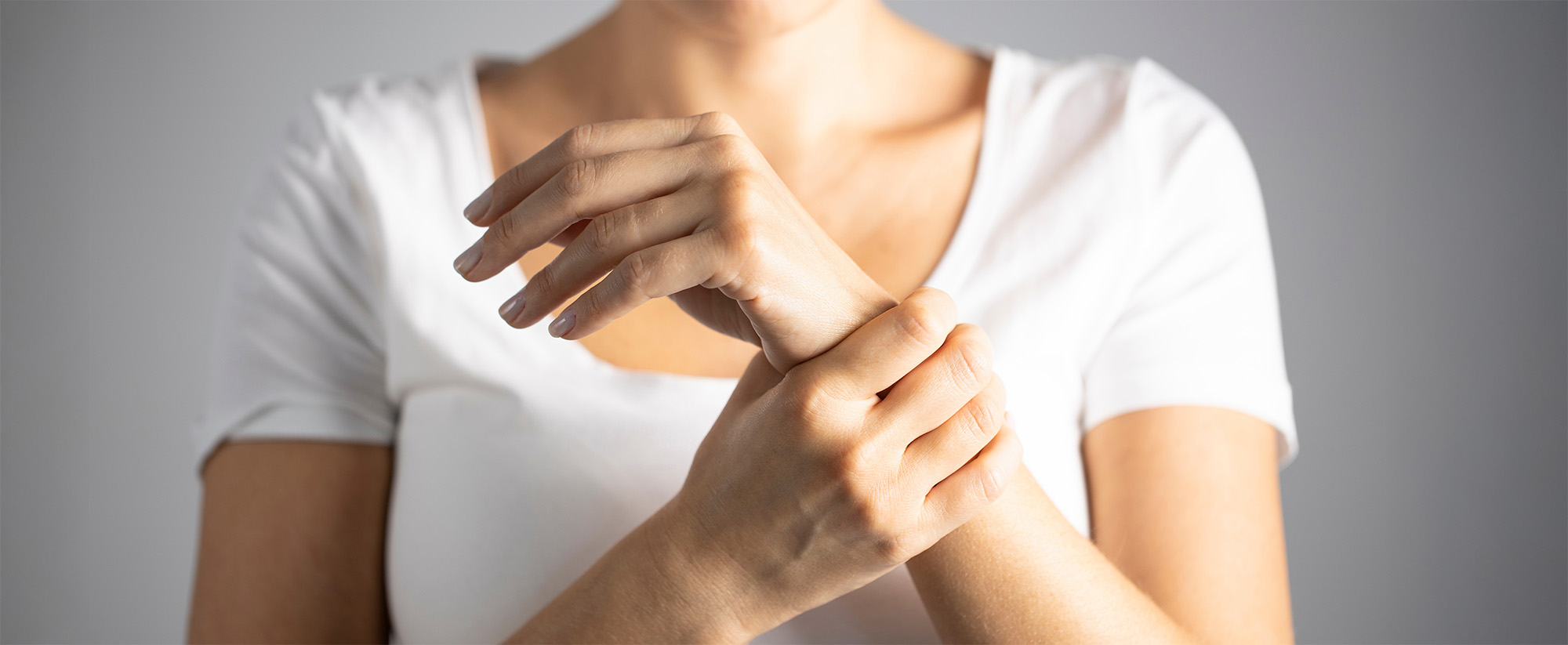 Young woman with wrist pain