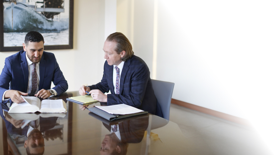 Prince George's County Injury & Criminal Lawyers Mike Berman & Jason Miller talking to each other